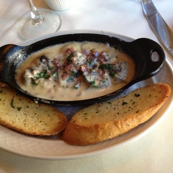 Prosecco - Lumache alla Romano (Jumbo snails, prosciutto di parma, vecchia romagna brandy and garlic cream reduction) - Italian Near Me - Chicago, Illinois Prosecco - Lumache alla Romano (Jumbo snails, prosciutto di parma, vecchia romagna brandy and garlic cream reduction) - Italian Near Me - Chicago, Illinois