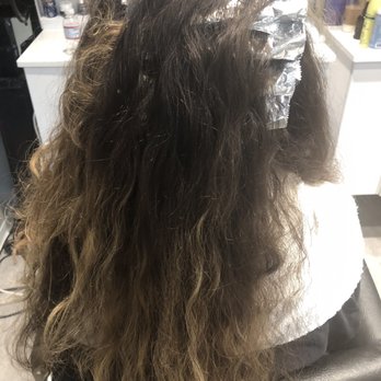 Mirage Salon - Getting highlights. - Hair Salons Near Me - Costa Mesa, California Mirage Salon - Getting highlights. - Hair Salons Near Me - Costa Mesa, California