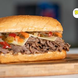 Da Catch - Italian beef sandwich your choice of dipping auj juice, American or mozzarella chz , and hot or sweet mix peppers.