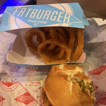 Fatburger - Crispy chicken sandwich (sorry, I had to take a few buys before pics) and their onion rings - Burgers Near Me - Lincoln, California