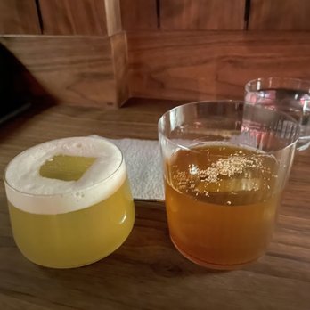 Double Chicken Please - Japanese cold noodle (left), Mango sticky rice cocktail (right) - Cocktail Bars Near Me - New York, New York Double Chicken Please - Japanese cold noodle (left), Mango sticky rice cocktail (right) - Cocktail Bars Near Me - New York, New York