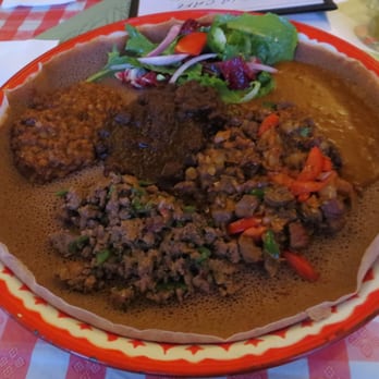 Jebena Cafe - Meat Combination II ($15.00) - For serious meat-lovers! A hearty platter of Kitfo, Qey Wot, Beef Tibs, and Veggie sides. - Ethiopian Near Me - Seattle, Washington