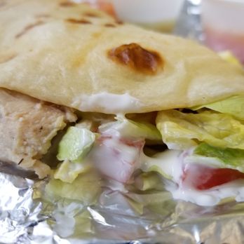 Taco Fam - Chicken quesadilla with a side of red and green sauce. - Mexican Near Me - Napoleon, Ohio Taco Fam - Chicken quesadilla with a side of red and green sauce. - Mexican Near Me - Napoleon, Ohio