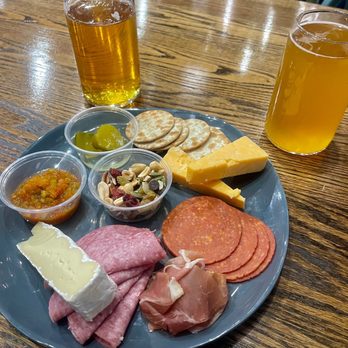 Peaceful Side Social - Cider and citrus beer with the Appalachian trail charcuterie plate - Breweries Near Me - Townsend, Tennessee