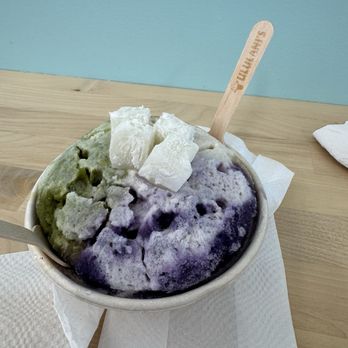 Ululani's Hawaiian Shave Ice - Off the menu. I think it's called the AI aka the land. Green tea, ube, coffee sits on top of coconut ice cream. - Desserts Near Me - Plano, Texas Ululani's Hawaiian Shave Ice - Off the menu. I think it's called the AI aka the land. Green tea, ube, coffee sits on top of coconut ice cream. - Desserts Near Me - Plano, Texas