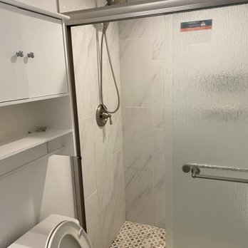 JM Handyman Pro - a clean bathroom - Flooring Near Me