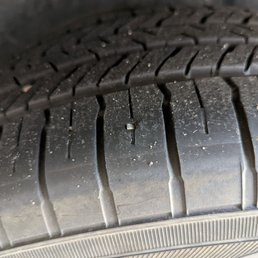 Nail or some metal object lodged in the tire tread. Tire held pressure for about 24 hours until flat. Nail or some metal object lodged in the tire tread. Tire held pressure for about 24 hours until flat.