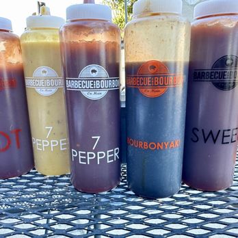 Barbecue And Bourbon - Several private label BBQ sauces. I tried the sweet sauce and enjoyed it. - Barbeque Near Me - Speedway, Indiana