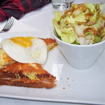 Chez Ribe - Croque Madame (fancy ham and cheese sandwich with egg) with a side salad - Brasseries Near Me - Paris, 75 Chez Ribe - Croque Madame (fancy ham and cheese sandwich with egg) with a side salad - Brasseries Near Me - Paris, 75
