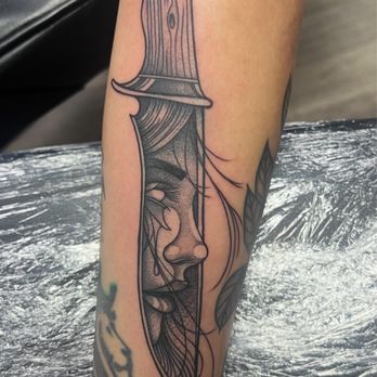 Outlaw Tattoo Studio and Body Piercing - Done by Pierce, dagger, love her - Tattoo Near Me - Temecula, California