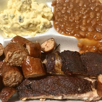 Whigham Family Kitchen - Combo dinner with ribs, sausage, potato salad and baked beans - Food Trucks Near Me - Brandon, Florida Whigham Family Kitchen - Combo dinner with ribs, sausage, potato salad and baked beans - Food Trucks Near Me - Brandon, Florida