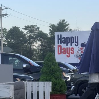 Happy Days - Front sign, and parking lot - American Near Me - Amsterdam, New York Happy Days - Front sign, and parking lot - American Near Me - Amsterdam, New York