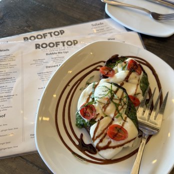 Rooftop - Portobello Mushrooms stuffed with fresh mozzarella cherry tomatoes and pesto - New American Near Me - Walnut Creek, California Rooftop - Portobello Mushrooms stuffed with fresh mozzarella cherry tomatoes and pesto - New American Near Me - Walnut Creek, California