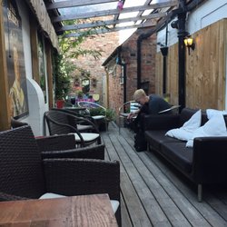 The Rook & Gaskill - Outdoor seating under cover or outdoor seating with no cover in the back.