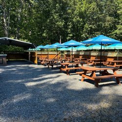 B-Man's 140 Tavern - Great shade and a little walking trail just beyond the fence. Huge parking lot just outside of the fence on the right.