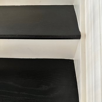 Designer Kitchen & Bath - HORRIBLE PAINT JOB ON THE BLACK AND WHITE STAIRS - Kitchen & Bath Near Me - Houston, Texas