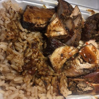 Reggae's Caribbean Restaurant - Jerk Pork and rice. Only available on Fridays and worth the wait. - Caribbean Near Me - London, Ontario Reggae's Caribbean Restaurant - Jerk Pork and rice. Only available on Fridays and worth the wait. - Caribbean Near Me - London, Ontario