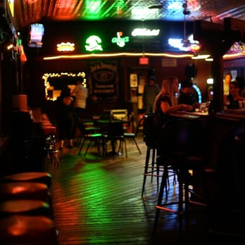 The Hub - people sitting at a bar with neon lights - Cocktail Bars Near Me - Ojai, California The Hub - people sitting at a bar with neon lights - Cocktail Bars Near Me - Ojai, California