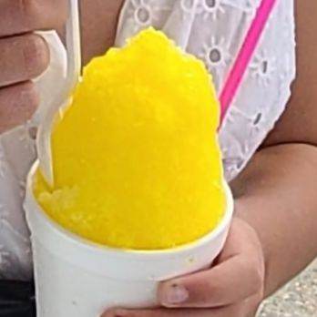 NOLA Sweet - a woman holding a cup of ice cream - Shaved Snow Near Me - Katy, Texas NOLA Sweet - a woman holding a cup of ice cream - Shaved Snow Near Me - Katy, Texas