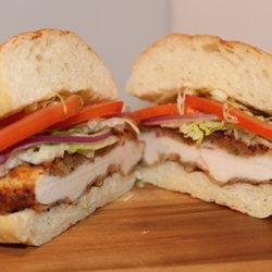 Our 6oz Fearless Mother Clucker fried chicken sandwich on an ACE Bakery Bun