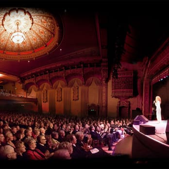 Mount Baker Theatre - a man standing on a stage in front of a crowd - Performing Arts Near Me - Bellingham, Washington Mount Baker Theatre - a man standing on a stage in front of a crowd - Performing Arts Near Me - Bellingham, Washington