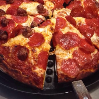 Pizza Bell - Half pepperoni and half pepperoni and sausage medium pizza. - Pizza Near Me - Elk Grove, California Pizza Bell - Half pepperoni and half pepperoni and sausage medium pizza. - Pizza Near Me - Elk Grove, California