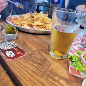 Chop Sports - Trash can nachos comes with pickled jalepenos. - Sports Bars Near Me - McKinney, Texas Chop Sports - Trash can nachos comes with pickled jalepenos. - Sports Bars Near Me - McKinney, Texas