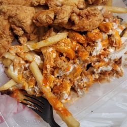 Kiki's Chicken Place - Kiki fries with ranch, buffalo sauce n chicken!