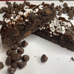 Cookie Love Cottage - Blackout chocolate cookie dough loaded with semisweet and milk chocolate chips. Stuffed with creamy chocolate ganache.