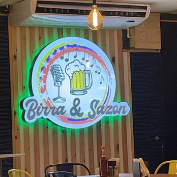 Birra & Sazon - a neon sign for birra and sazon - Venezuelan Near Me - Davenport, Florida Birra & Sazon - a neon sign for birra and sazon - Venezuelan Near Me - Davenport, Florida