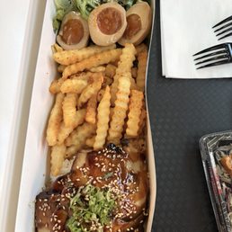 Bento lunch deal with chashu pork, seasoned fries, marinated soy eggs, and it came with gyoza and a lil salad. Bento lunch deal with chashu pork, seasoned fries, marinated soy eggs, and it came with gyoza and a lil salad.