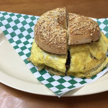 City Bagel and Cafe - Pastrami, egg and Swiss on toasted Asiago cheese bagel. - Cafes Near Me - Sandy Springs, Georgia