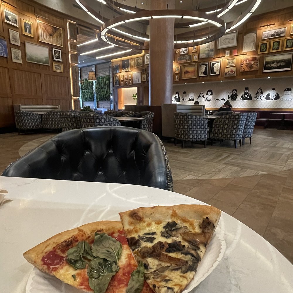 Andy’s Pizza - Tysons - Slices of mushroom & margherita pizza @ Urbanspace dining area. - Pizza Near Me - McLean, Virginia Andy’s Pizza - Tysons - Slices of mushroom & margherita pizza @ Urbanspace dining area. - Pizza Near Me - McLean, Virginia