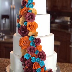 Meraki Custom Cakes - Wedding cake with handmade sugar flowers for a fall wedding. Lemon poppyseed with raspberry filling and vanilla buttercream.