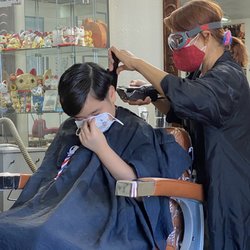 Quickcut Studio - Lek practicing safe haircut procedures amid pandemic. She always wants your mask on at all times.