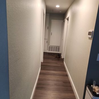 Roofing Plus Construction - Luxury vinyl in the main hallway. - Roofing Near Me - Upland, California
