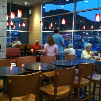 Wendy's - people sitting at tables in a restaurant - Burgers Near Me - White Oak, Pennsylvania