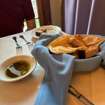 The Mediterranean Restaurant - Gratis pita and sourdough. Olive oil dipping sauce with some kind of herb. I thought it lacked salt. - Mediterranean Near Me - West Chester, Pennsylvania The Mediterranean Restaurant - Gratis pita and sourdough. Olive oil dipping sauce with some kind of herb. I thought it lacked salt. - Mediterranean Near Me - West Chester, Pennsylvania