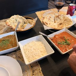 Chicken, chef, special, tiki masala, chicken, garlic, naan, and butter naan Chicken, chef, special, tiki masala, chicken, garlic, naan, and butter naan