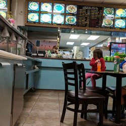 Ever Green Chinese Food - Menu stuck to the table! Pickup is my choice ATM.