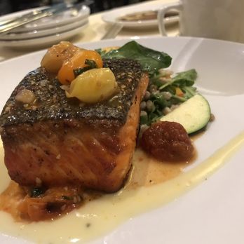 Piatti - My choice of cast iron king salmon, zucchini, peach, farro, arugula, charred tomato relish, citrus vinaigrette for main course - Italian Near Me - Sacramento, California Piatti - My choice of cast iron king salmon, zucchini, peach, farro, arugula, charred tomato relish, citrus vinaigrette for main course - Italian Near Me - Sacramento, California