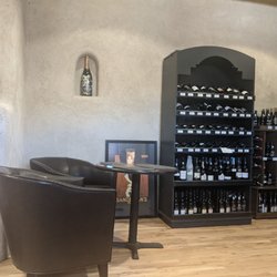 Susan's Fine Wine and Spirits - Lounge area. Super cozy and fun, relaxing vibes. Dog friendly, too!