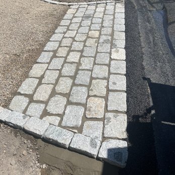 Introspec Design Construction - Fully completed jumbo cobblestone apron - Stonemasons Near Me - Dennis, Massachusetts Introspec Design Construction - Fully completed jumbo cobblestone apron - Stonemasons Near Me - Dennis, Massachusetts