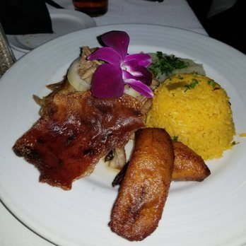 Coco Palm Restaurant - Shredded pork with crispy pig skin, yellow rice, plantains. Yummy! - Cuban Near Me - Pomona, California