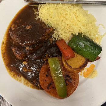 Avatar's Restaurant - Jamaican Jerk Chicken. Sauce is good, has 3 piece of white chicken meat for the price of $21.95. - Indian Near Me - Sausalito, California