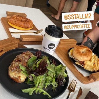 Cuppi Coffee - Chocolate Croissant, O'Honey bacon sandwich and apple maple Toast - Coffee & Tea Near Me - Bristow, Virginia Cuppi Coffee - Chocolate Croissant, O'Honey bacon sandwich and apple maple Toast - Coffee & Tea Near Me - Bristow, Virginia