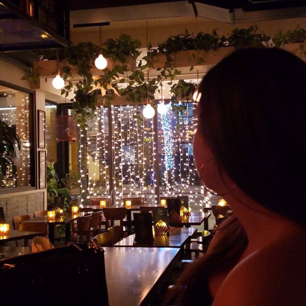 Social Verdun - a woman sitting at a bar - Bars Near Me - Montreal, Quebec Social Verdun - a woman sitting at a bar - Bars Near Me - Montreal, Quebec
