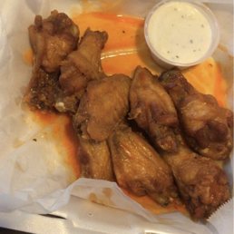 chicken wings in a styrofoam container