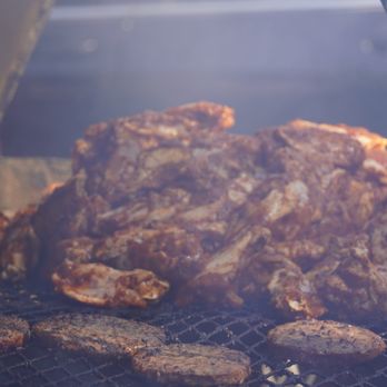 Tipsy Smash Mouth BBQ - meat cooking on a grill - Food Stands Near Me Tipsy Smash Mouth BBQ - meat cooking on a grill - Food Stands Near Me