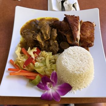 Epican Jamaican Restaurant - Curry goat/fried chicken combo - Desserts Near Me - Houston, Texas